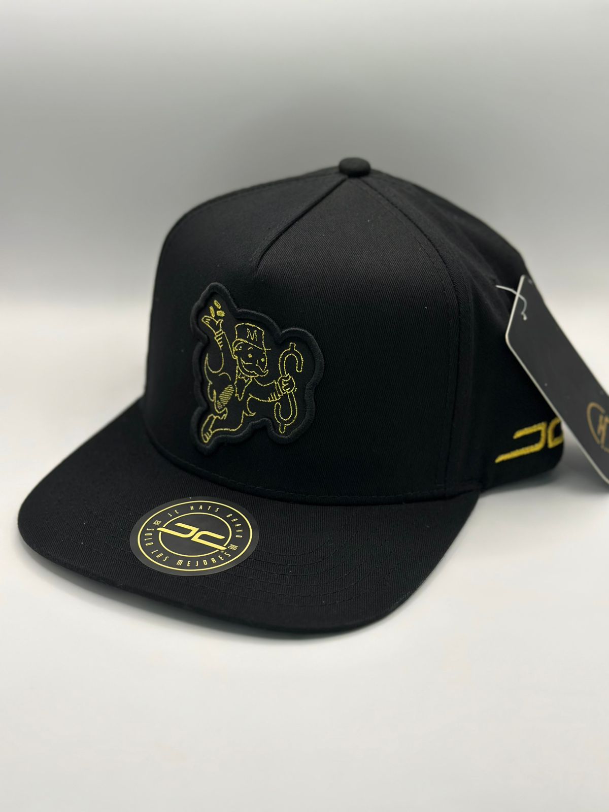 Gorra JC jump black/gold